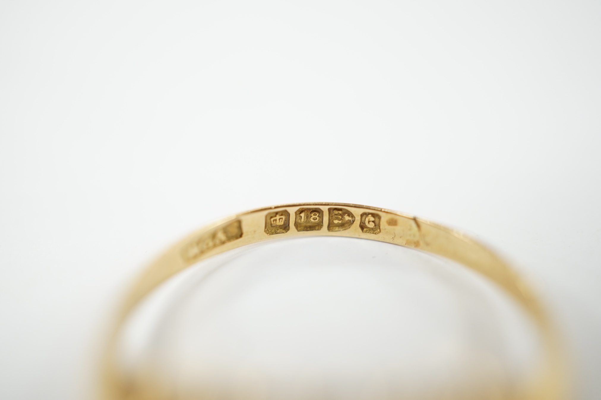 An Edwardian 18ct gold and three stone red doublet set ring, size L, gross weight 2.5 grams. Condition - fair